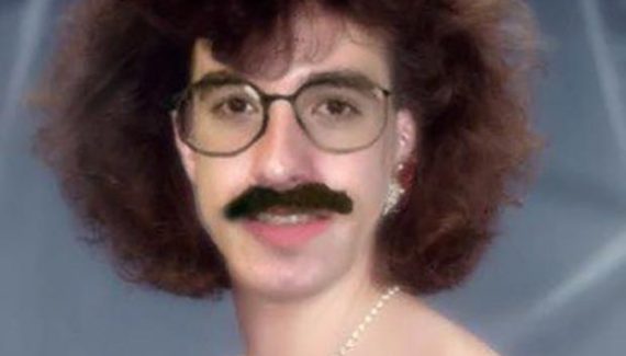 Awkward family photo vintage Own Mills portrait laser beams, man in womens clothes boa